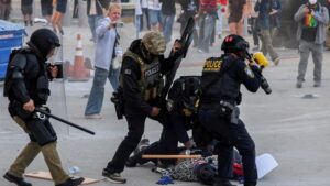 2025-06-12T090114Z-1082017127-RC2EXEA6WL5W-RTRMADP-3-USA-MIGRATION-GOVERNORS