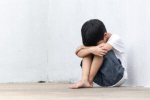 A,Boy,Sitting,Alone,With,Sad,Feeling.,Asian,Little,Child