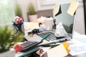 depositphotos_506313764-stock-photo-messy-cluttered-office-desk