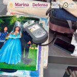 Cae hombre en el AICM con cocaína escondida en pinturas y lienzos enrollados